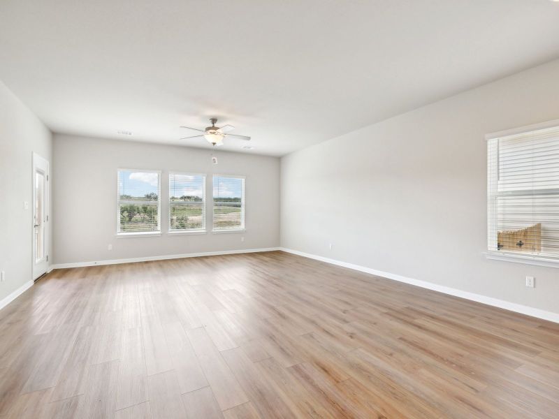 Spacious, unfurnished interior of a new home in Big Sky Ranch - Reserve Collection, Dripping Springs (Image 7).