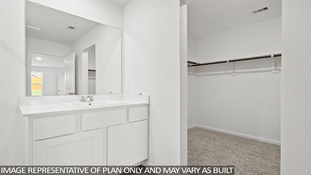 Furnished interior view inside a new home in Sunterra, Katy (Image 6).