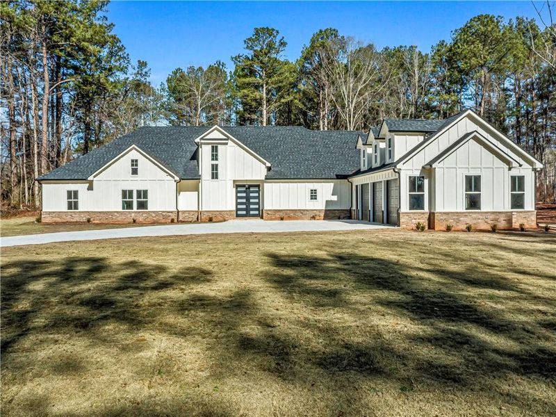 Front exterior of a new home in , Fayetteville, GA, highlighting curb appeal (Image 25).