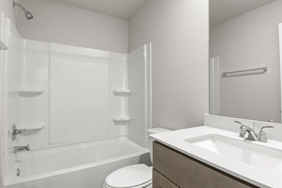 Image of bedroom with a shower and tub with a mirror and vanity Image of bedroom with a shower and tub with a mirror and vanity