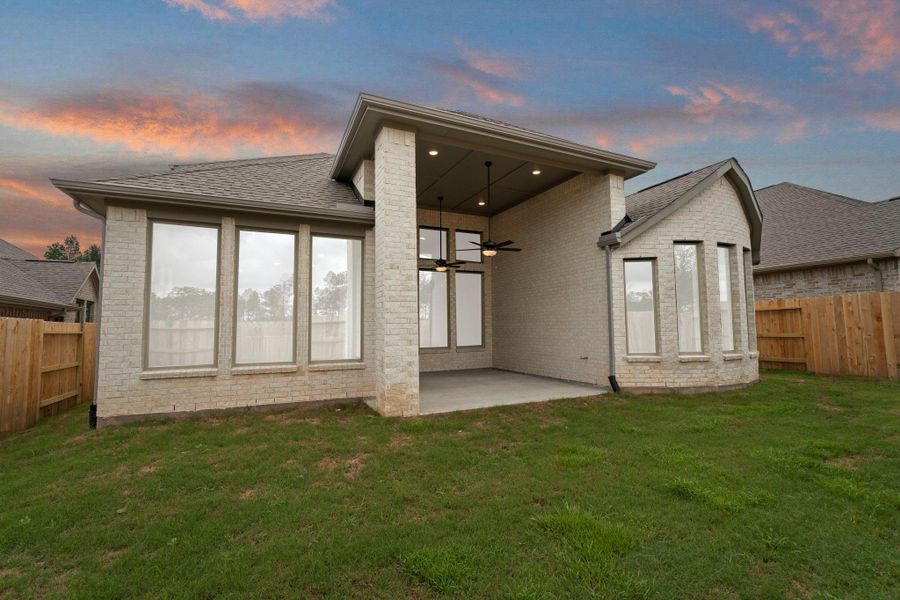 Exterior details and patio area of a home in Wildtree, Magnolia (Image 3).