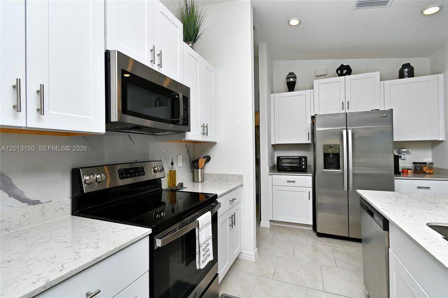 Furnished interior view inside a new home in , Lehigh Acres (Image 8).