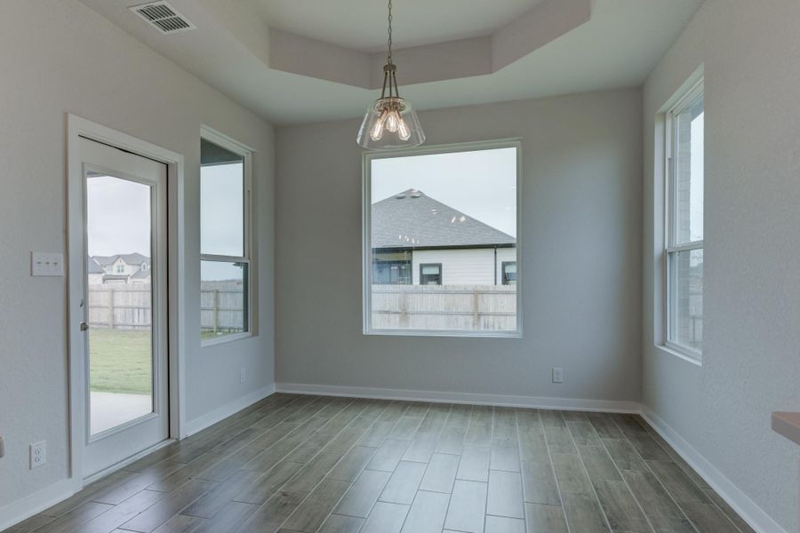 Representative unfurnished interior of a home built from the Guadalupe by Ashton Woods in The Heritage at Saddlebrook Ranch 70's, Schertz (Image 16).