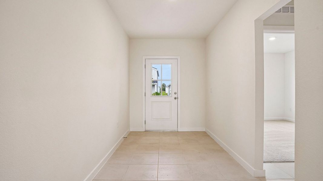 Furnished interior view inside a new home in Willowbrook North, Winter Haven (Image 7).