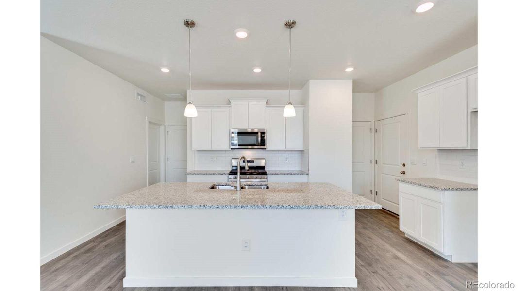 Furnished interior view inside a new home in The Ridge at Lorson Ranch, Colorado Springs (Image 6).