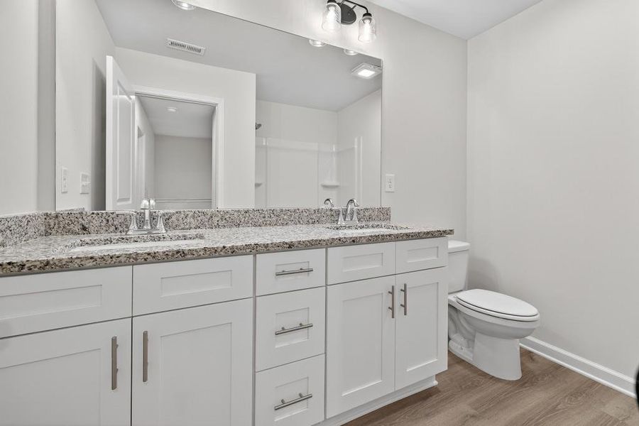 Furnished interior view inside a new home in Medlock Park, Austell (Image 11).