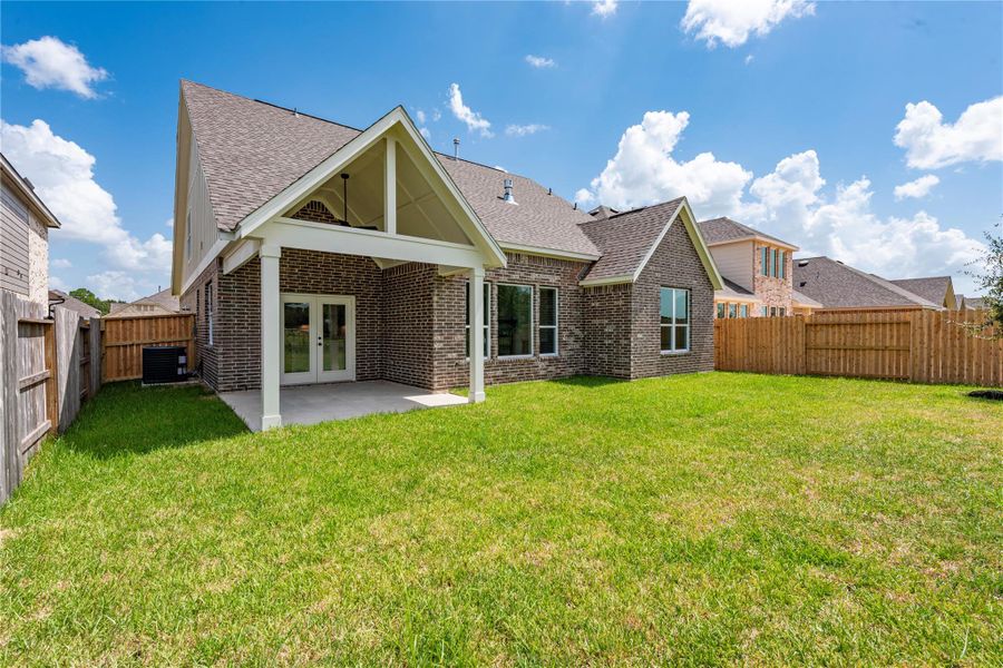 Front exterior of a new home in , Santa Fe, TX, highlighting curb appeal (Image 20).