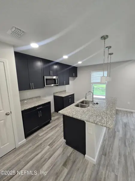 Furnished interior view inside a new home in , Jacksonville (Image 6). Furnished interior view inside a new home in , Jacksonville (Image 6).