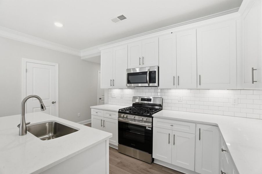 Furnished interior view inside a new home in Harrisburg Village Townhomes, Harrisburg (Image 9).