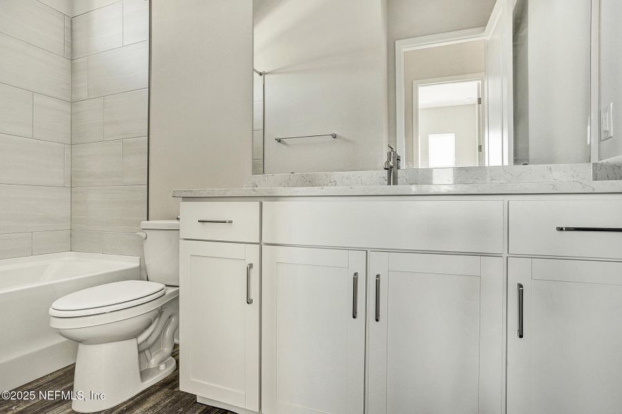 Furnished interior view inside a new home in Reverie at Silverleaf, St. Augustine (Image 6).