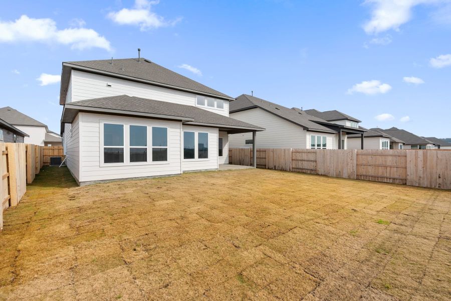 Exterior details and patio area of a home in Lagos Reserve, Manor (Image 28). Exterior details and patio area of a home in Lagos Reserve, Manor (Image 28).