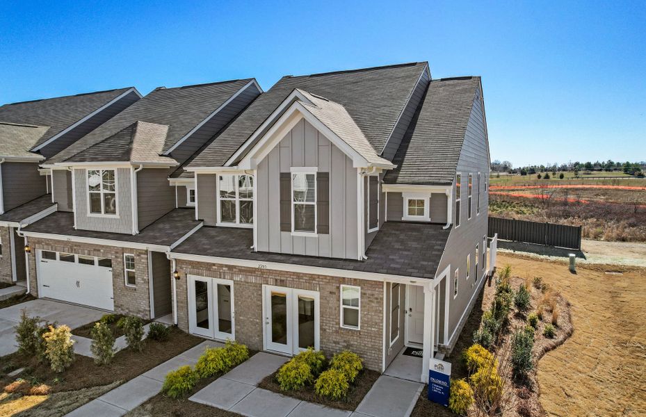 Front exterior of a new home in Riverstone, Monroe, NC, highlighting curb appeal (Image 24). Front exterior of a new home in Riverstone, Monroe, NC, highlighting curb appeal (Image 24).