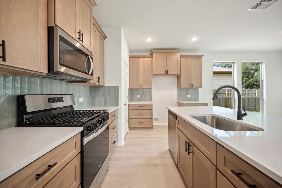 Furnished interior view inside a new home in The Hills of Bear Creek, Manchaca (Image 9).