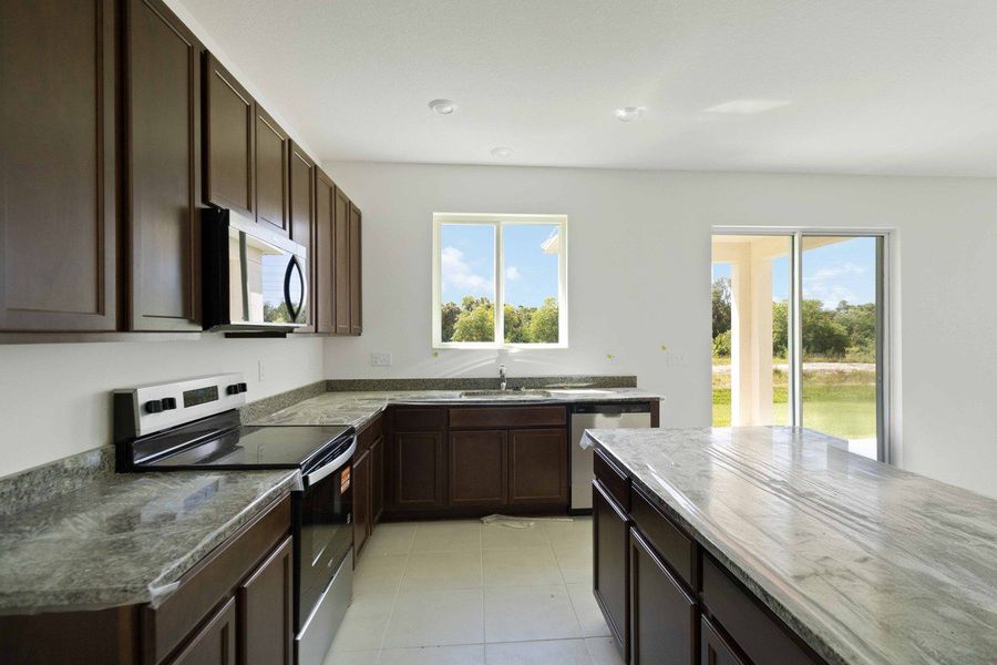 Furnished interior view inside a new home in Coves of Estero Bay, Fort Myers (Image 3).