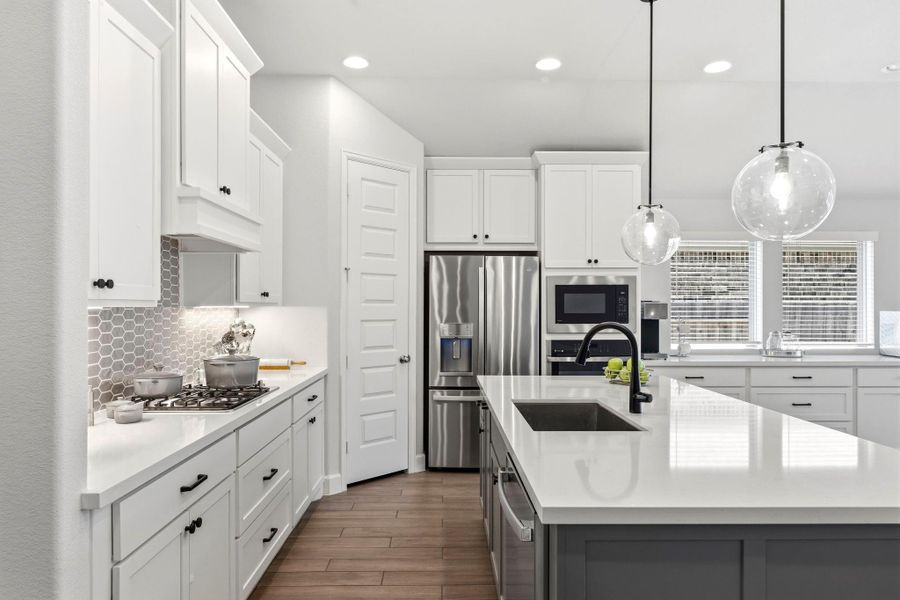 Well Designed Island Kitchen with Granite Island, Pendant Lighting, Deep Single Sink, Stainless Appliances, Gas Cooking, Corner Pantry and Refrigerator Can Stay! Well Designed Island Kitchen with Granite Island, Pendant Lighting, Deep Single Sink, Stainless Appliances, Gas Cooking, Corner Pantry and Refrigerator Can Stay!