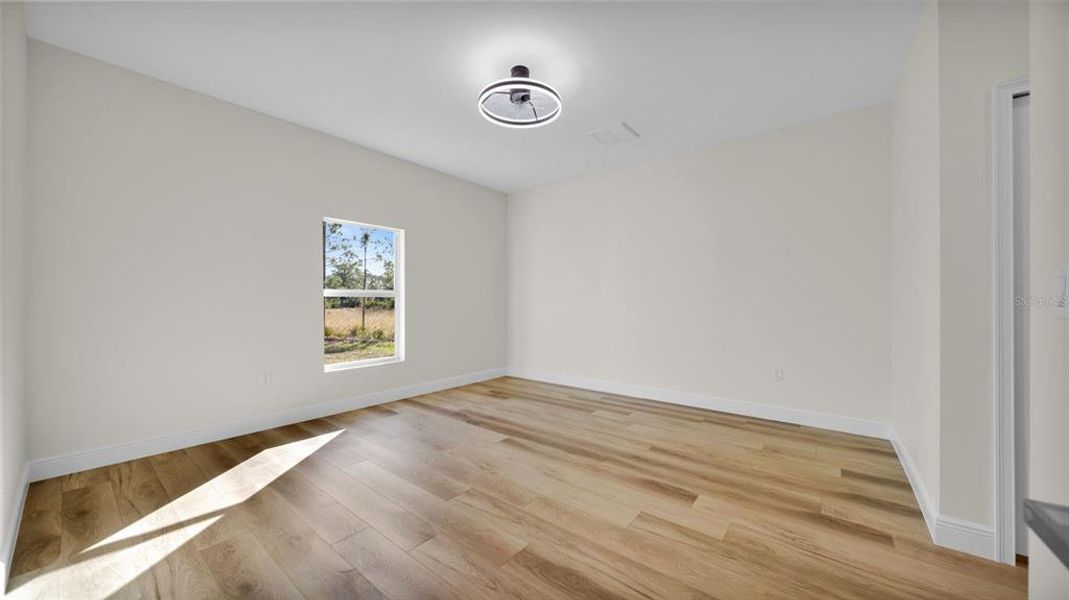 Spacious, unfurnished interior of a new home in , Port Charlotte (Image 18).