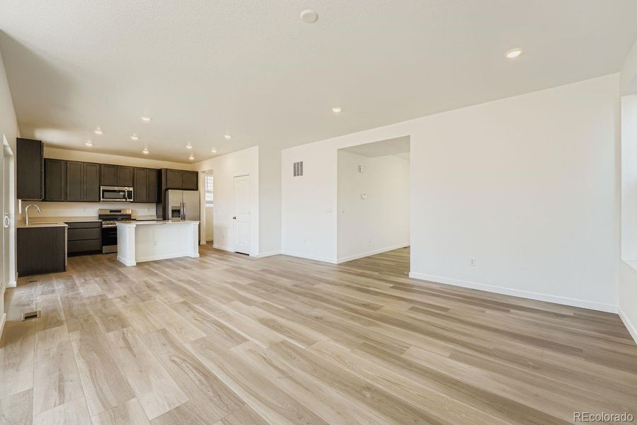 Spacious, unfurnished interior of a new home in Ken-Caryl Ranch: The Pioneer Collection, Littleton (Image 9). Spacious, unfurnished interior of a new home in Ken-Caryl Ranch: The Pioneer Collection, Littleton (Image 9).