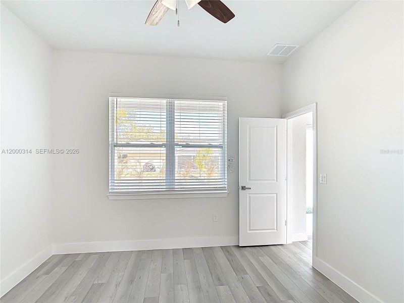 Spacious, unfurnished interior of a new home in , Port Charlotte (Image 18).