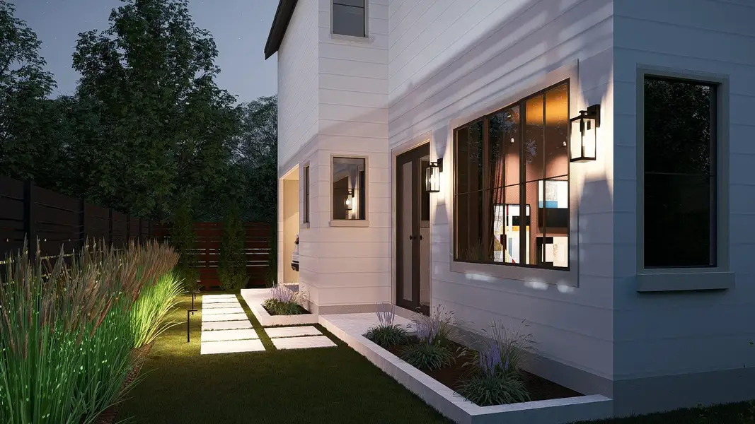 The property features a well-maintained lawn with pathway lighting and a stone slab walkway