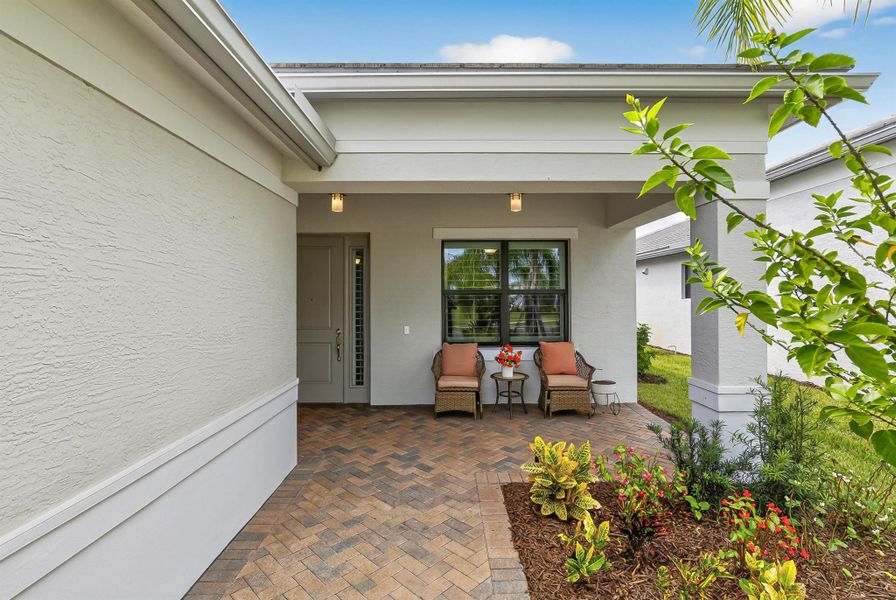 Front exterior of a new home in , Port St. Lucie, FL, highlighting curb appeal (Image 19).
