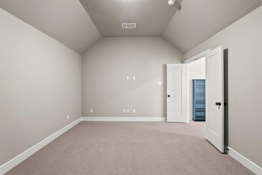 Upstairs media room with double doors and surround sound prewire Upstairs media room with double doors and surround sound prewire