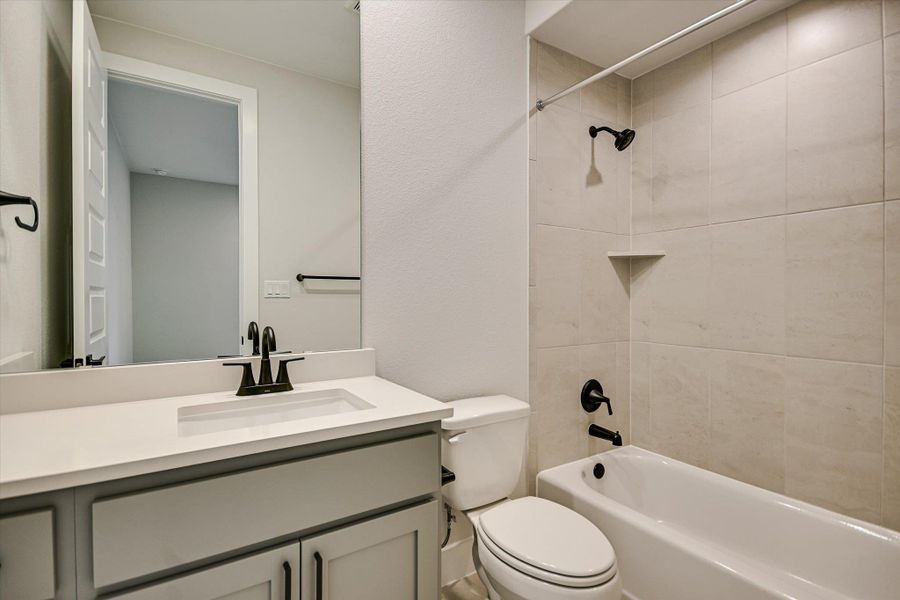 Furnished interior view inside a new home in Riverstone, Georgetown (Image 7).