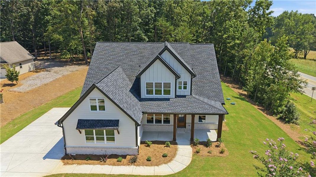 Front exterior of a new home in , Lula, GA, highlighting curb appeal (Image 32). Front exterior of a new home in , Lula, GA, highlighting curb appeal (Image 32).