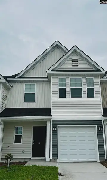 Front exterior of a new home in Percival Village, Columbia, SC, highlighting curb appeal (Image 1). Front exterior of a new home in Percival Village, Columbia, SC, highlighting curb appeal (Image 1).