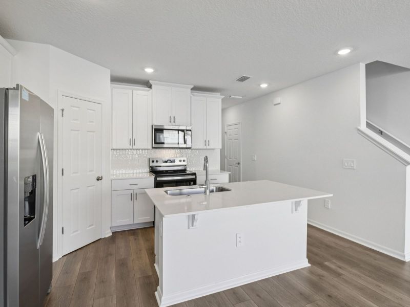Furnished interior view inside a new home in Cagan Crossings West, Clermont (Image 4).