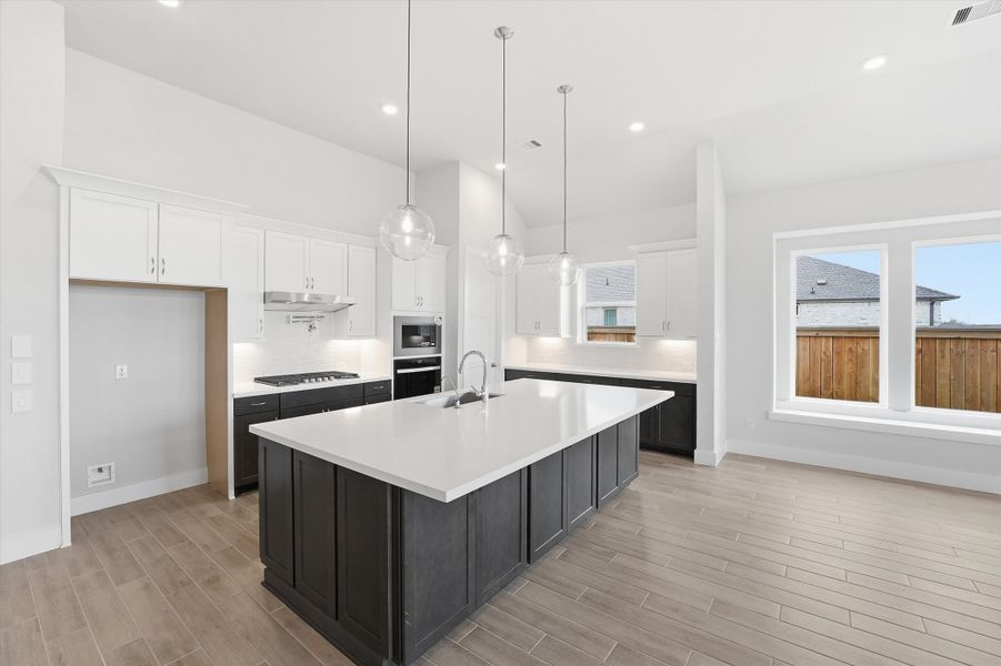 Furnished interior view inside a new home in Bridgeland, Cypress (Image 6).
