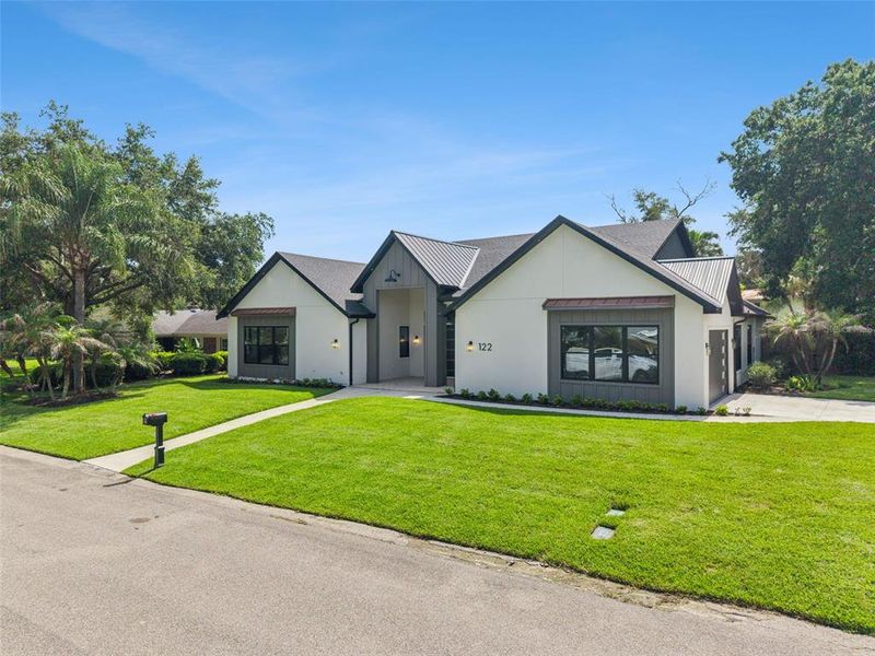 Front exterior of a new home in , Altamonte Springs, FL, highlighting curb appeal (Image 32). Front exterior of a new home in , Altamonte Springs, FL, highlighting curb appeal (Image 32).