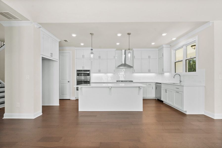 Representative furnished interior of a home built from the The Blaylock by The Providence Group in Promenade at Sawnee Village, Cumming (Image 6).