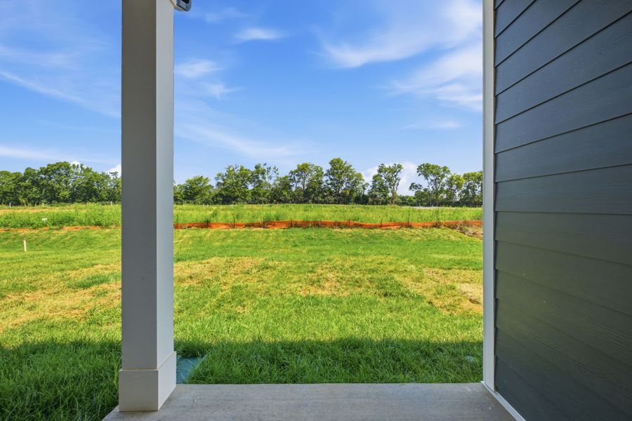 Exterior details and patio area of a home in Nexus Townhomes, Gallatin (Image 4).