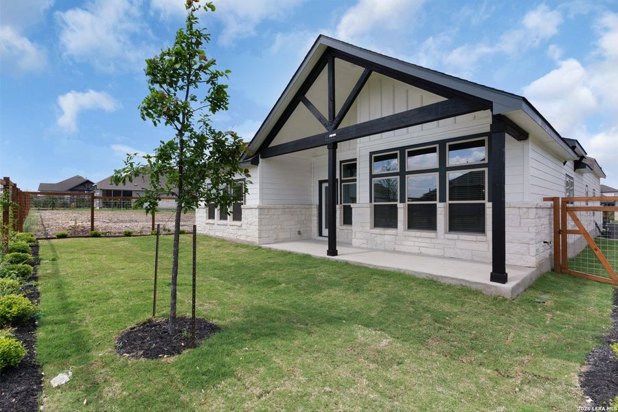 Exterior details and patio area of a home in The Crossvine, Schertz (Image 3).
