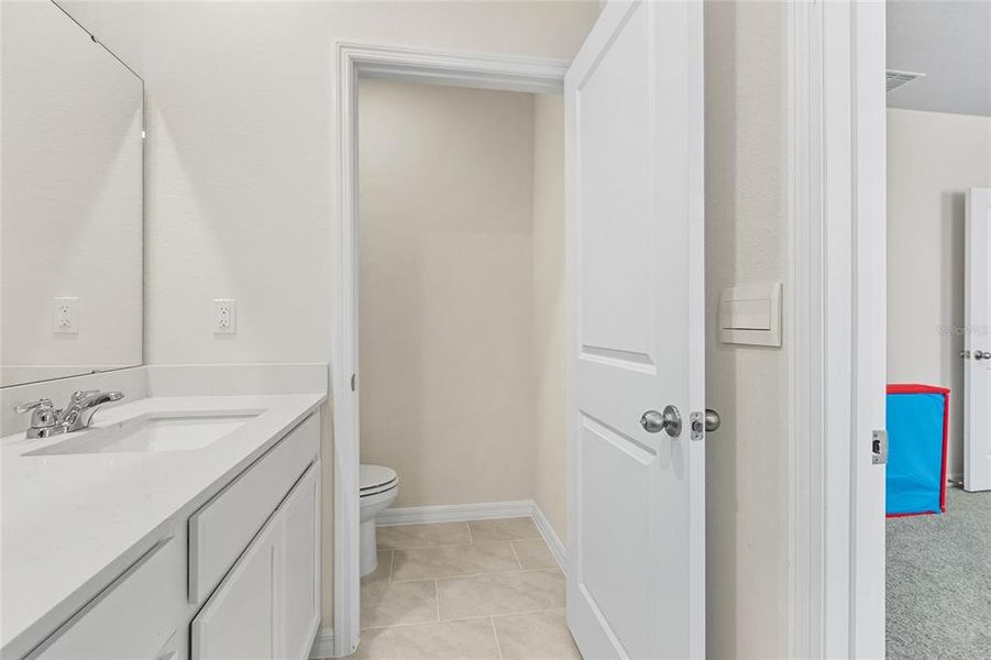 Furnished interior view inside a new home in Lake Deer Estates, Poinciana (Image 6).
