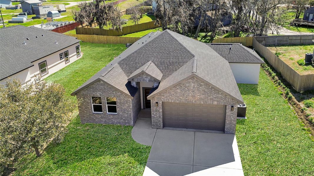 Front exterior of a new home in , Montgomery, TX, highlighting curb appeal (Image 14).