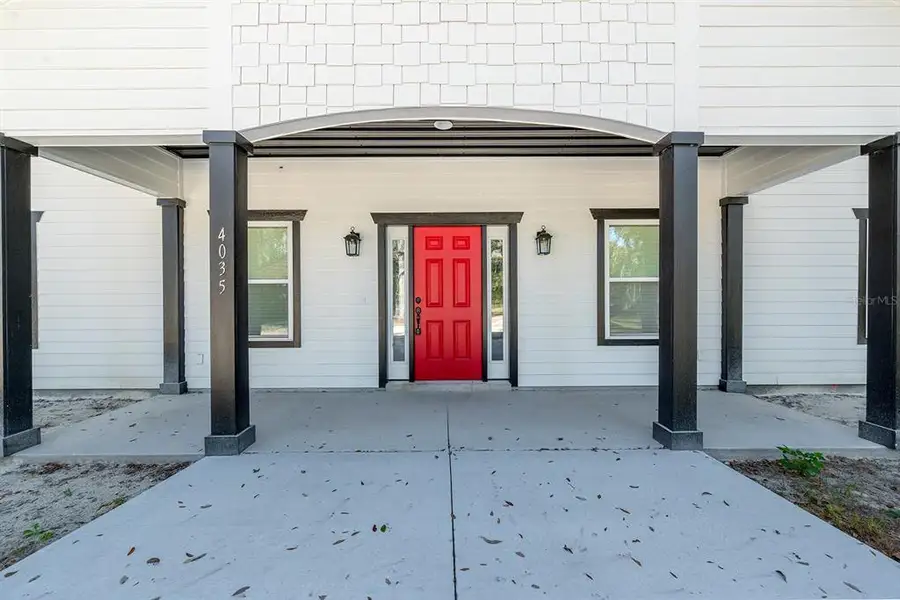 Exterior details and patio area of a home in , Bell (Image 4).