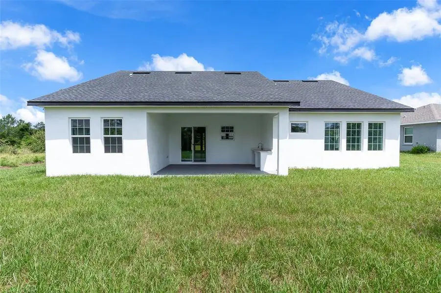 Exterior details and patio area of a home in , Ocala (Image 3).