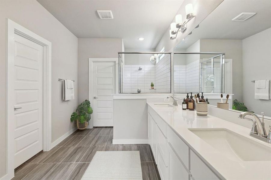 Primary Bathroom in the Morrison home plan by Trophy Signature Homes – REPRESENTATIVE PHOTO Primary Bathroom in the Morrison home plan by Trophy Signature Homes – REPRESENTATIVE PHOTO