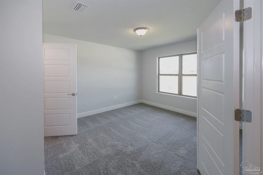 Spacious, unfurnished interior of a new home in Emmaline Gardens, Milton (Image 16). Spacious, unfurnished interior of a new home in Emmaline Gardens, Milton (Image 16).