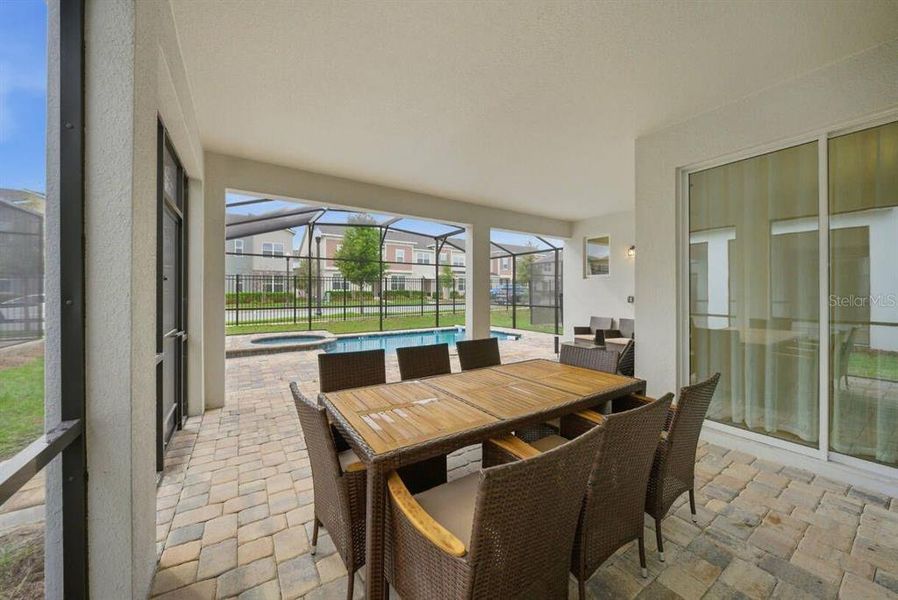 Exterior details and patio area of a home in Solara Resort, Kissimmee (Image 3).
