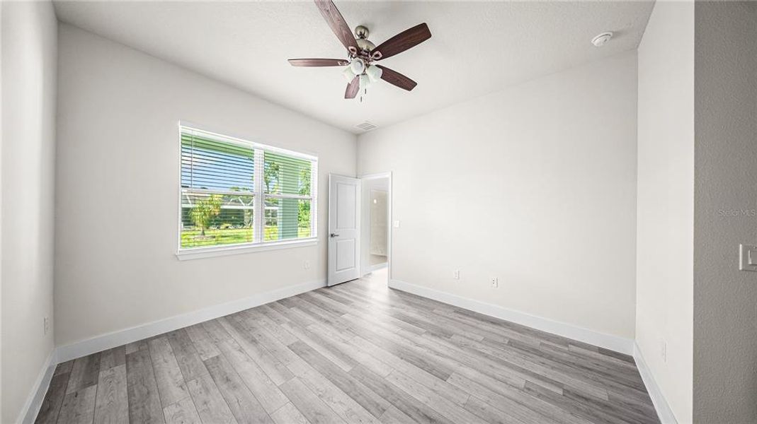 Spacious, unfurnished interior of a new home in , Port Charlotte (Image 40).