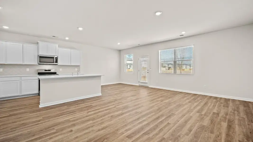 Representative unfurnished interior of a home built from the Saratoga by D.R. Horton in Branford Crossing, Stockbridge (Image 11).