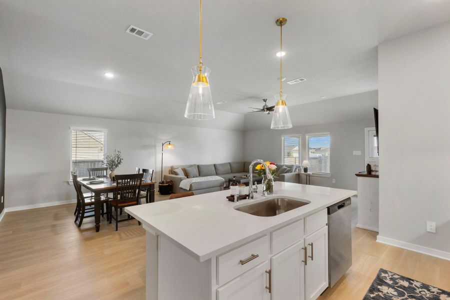 The kitchen opens into the family room.