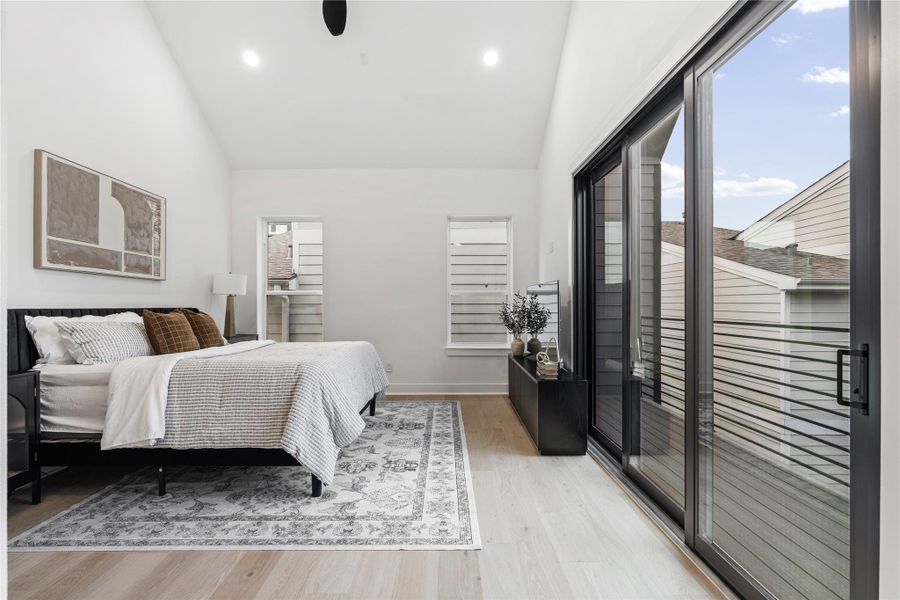 Elevated on the third floor, the primary suite reads as a tranquil pavilion—its vaulted geometry and dual exposures shaping a calm, luminous volume. Solid-core doors and a discreet vestibule preserve privacy, while intuitive circulation draws you toward the ensuite spa and custom wardrobe. Quietly luxurious, purposefully composed.