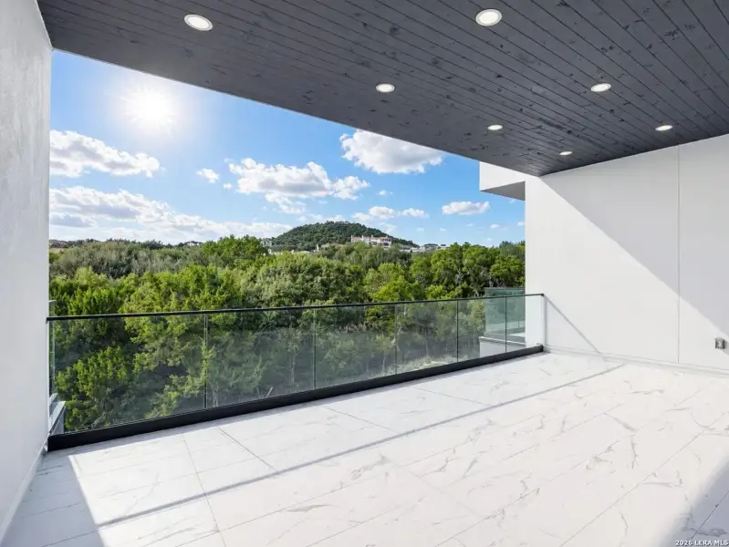 Exterior details and patio area of a home in , San Antonio (Image 35).
