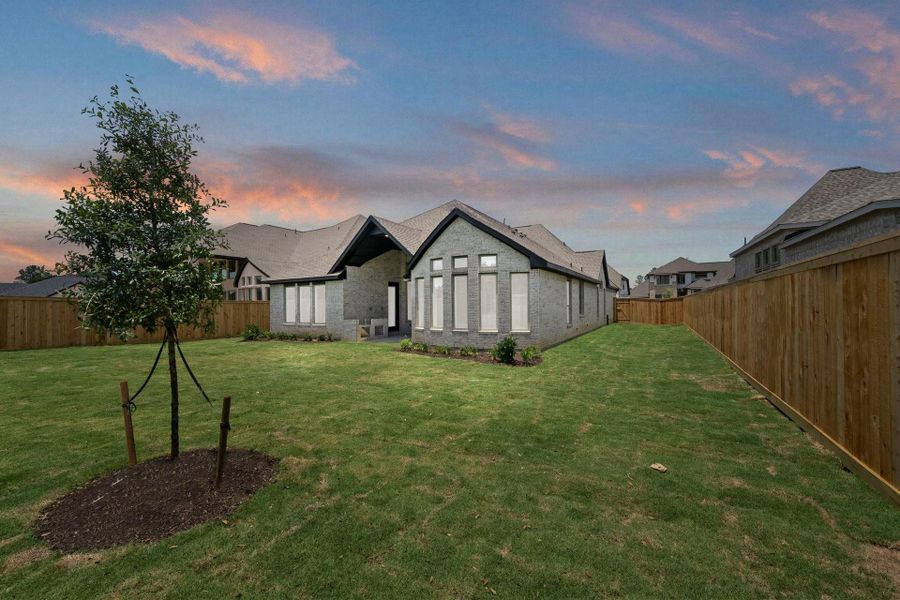 Exterior details and patio area of a home in The Highlands, Porter (Image 19).