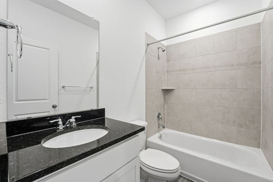 Furnished interior view inside a new home in Longview, Del Valle (Image 8).