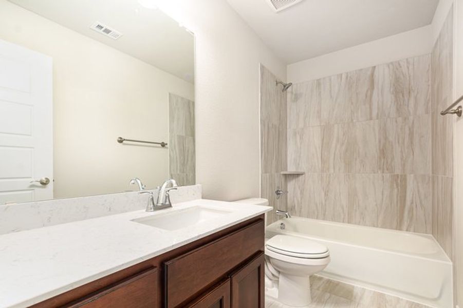 Furnished interior view inside a new home in Courts Of Bonnie Brae, Denton (Image 10).