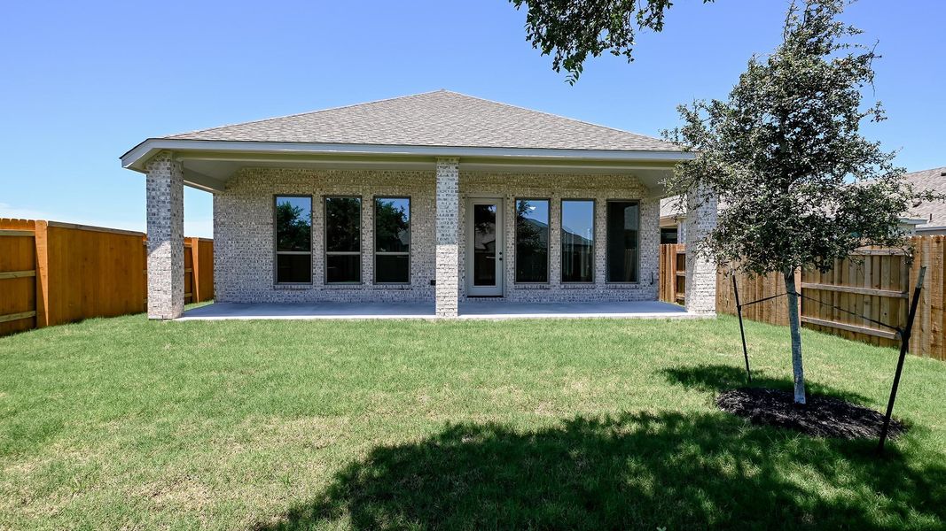 Exterior details and patio area of a home in 6 Creeks, Kyle (Image 4).
